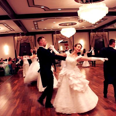 young couple dancing at ball